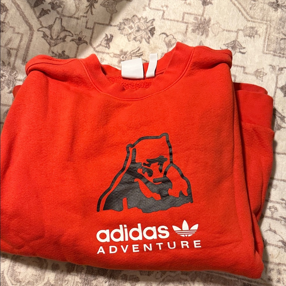 Men’s Adidas crew neck.